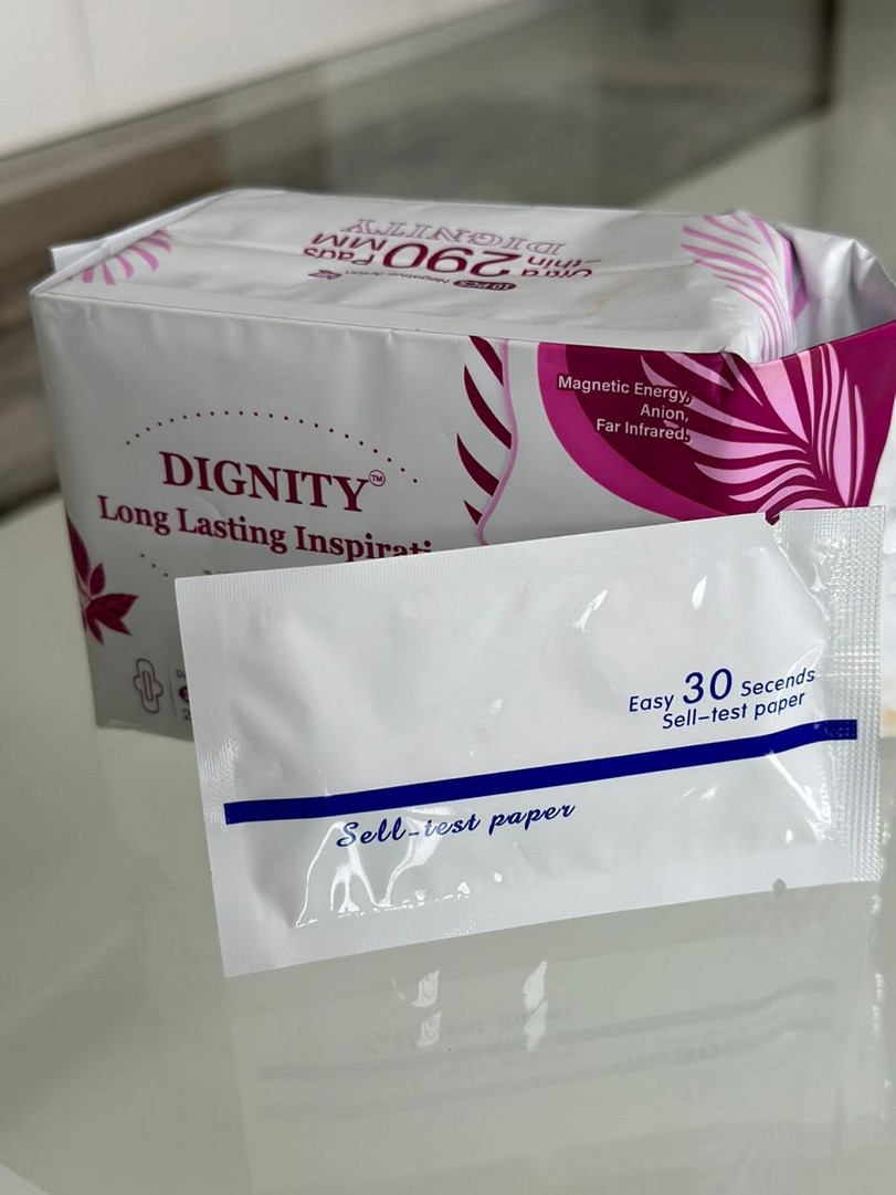 Dignity pad pack with a self-test paper